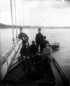 [Mr. Murphy and others on yacht, Waterford, near view]