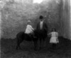 [Michael Widger and children with pony, Waterford]