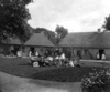 [The Clampett family, taken in front of cottages, Dunmore East, Co. Waterford]