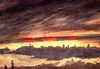 [A silhouette panorama of a city at sunset]