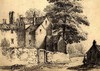 [View of the back of houses by the roadside with a figure standing at the corner]