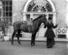 [Miss O'Neill Power holding horse]