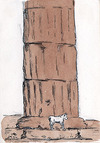[Dog standing at the base of a column]