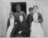 [Family group at doorway of house, Coolgreany, Co.Wexford]