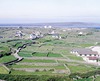 [Aran Islands, view of houses, fields and stone walls]