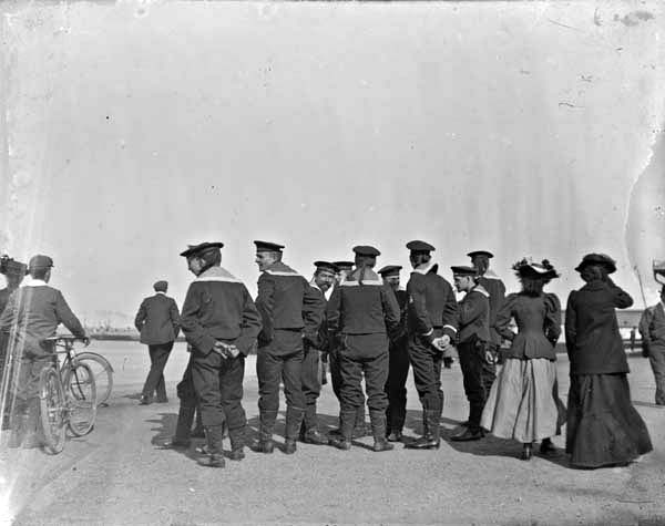 Sailors standing near the seafront in Kingstown