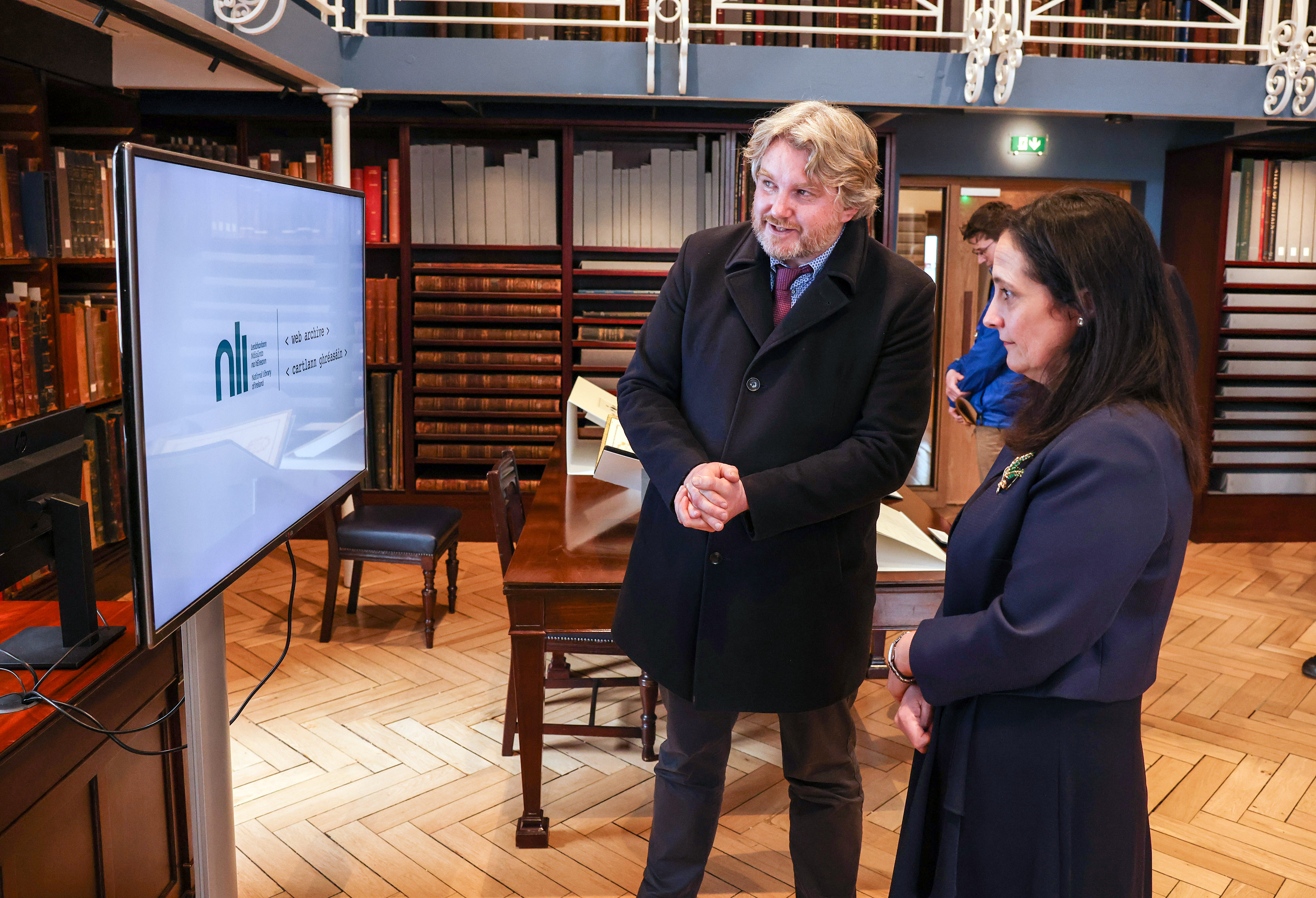 Head of Digital Collections, Eoghan Ó Carragáin shares the NLI Web Archive project with Minister Martin.