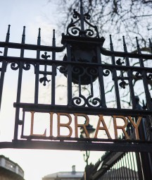 Library signage on gate