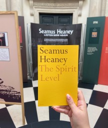 a copy of seamus heaney's poetry collection 'the spirit level' in the exhibition entrance 