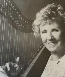 Image of Grainne Yeats with a harp