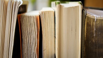 Photograph of 5 books.