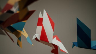 Photograph of art installation in the form of colourful origami birds.