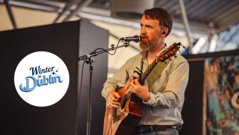 Enda Reilly performing on stage