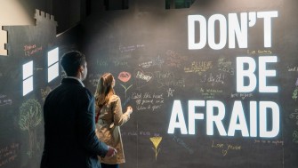 Couple in front of Maser, 'Don't Be Afraid' installation 