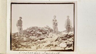 men standing at Clochán Leo on Inishark, Co. Galway