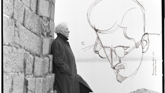 Heaney standing in front of the sea with sketch of joyce