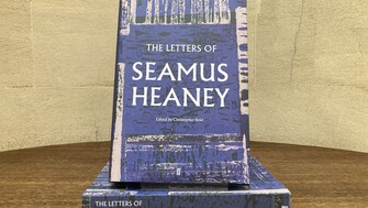 A photo of the book 'The Letters of Seamus Heaney' against a marble background