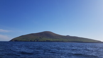 A photograph of an island from across the water