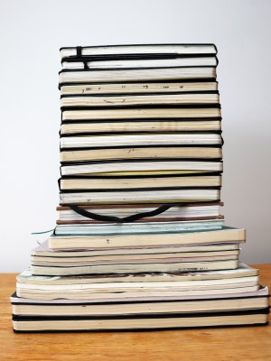 Pile of sketchbooks
