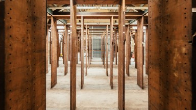 An room of empty book stack brackets