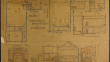 A yellowed and worn page with the hand-sketched blueprints for the Abbey Theatre