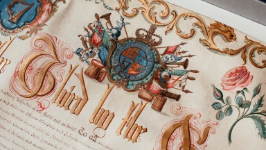 Close up photograph of illuminated letters patent granting Thomas, Lord Howth, the titles of Viscount St Lawrence and Earl of Howth, 3rd September 1767 
