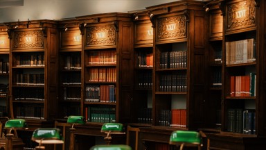 Brown bookshelves inside the NLI's Reading Room