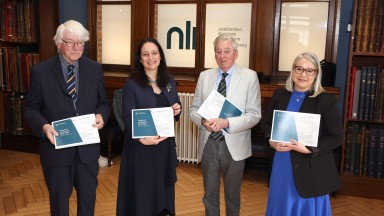 Standing left to right, Dr Martin Mansergh, Minister Catherine Martin, Dr Maurice Manning and NLI Director Audrey Whitty holding printed programme of events