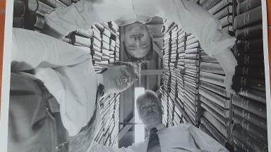 Three men photographed from below