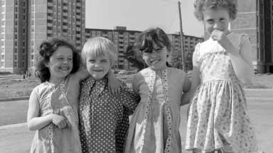 Group of little girls in front of tower blocks, Ballymun, Dublin