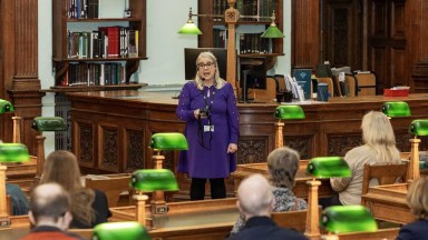 Dr Audrey Whitty, Director of the National Library of Ireland, giving a tour inside the Reading Room
