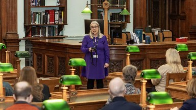 Dr Audrey Whitty, Director of the National Library of Ireland, giving a tour inside the Reading Room