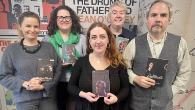 Group holding pamphlets in NLI Sean O'Casey Room
