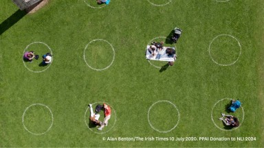 Visitors to the Royal Hospital in Kilmainham on the front lawn of the Irish Museum of Modern Art (IMMA)