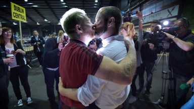 Michael Barron and Jaime Nanci kiss during the Marriage Equality Count