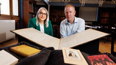 photo of people with book