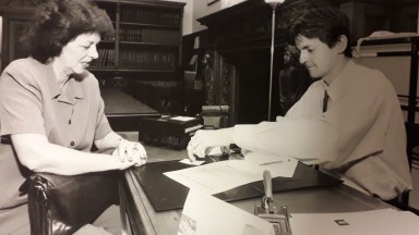James issuing a reader with a reader's ticket.