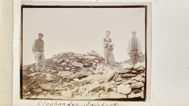 men standing at Clochán Leo on Inishark, Co. Galway