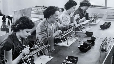 women working on machines
