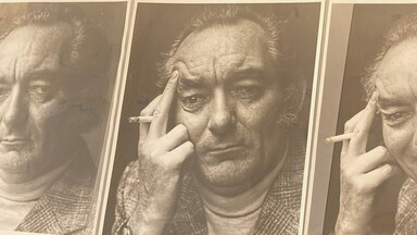 Brian Friel holding a cigarette; Photographs by Fergus Bourke. NLI MS 37, 472. 