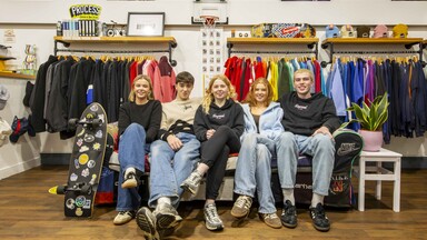 Group photo inside a shop