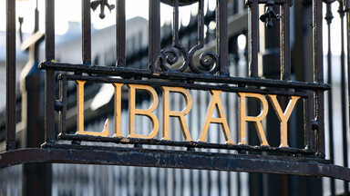 National Library of Ireland main entrance gate with black railings and gold lettering