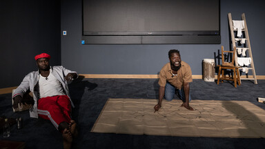Ibrahima Diouf and David Abraham Diémé, from Brrr Productions, perform a scene from a French-language adaptation of Translations.