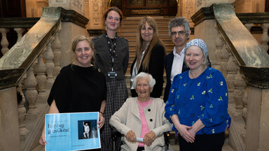 NLI staff pose with Virginie Roche-Tiengo (middle back) and Anne Friel (front center). Left to right: Sinéad MCoole, Head of Exhibitions, Learning and Programming; Anna Wallace Pitts;  Crónán Ó Doibhlin; and Bríd O'Sullivan.