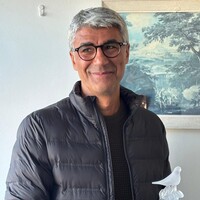 photo of ilhan sami comak