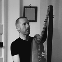 photo of simon chadwick with harp
