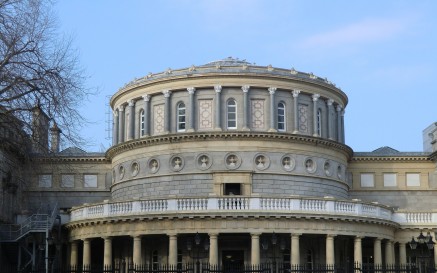 The main building of National Library of Ireland with blue sky.