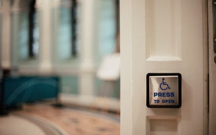 Image of the wheelchair accessible button at the door