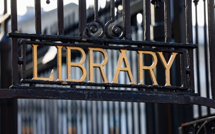 Library signage on gate
