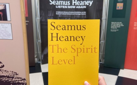 a copy of seamus heaney's poetry collection 'the spirit level' in the exhibition entrance 